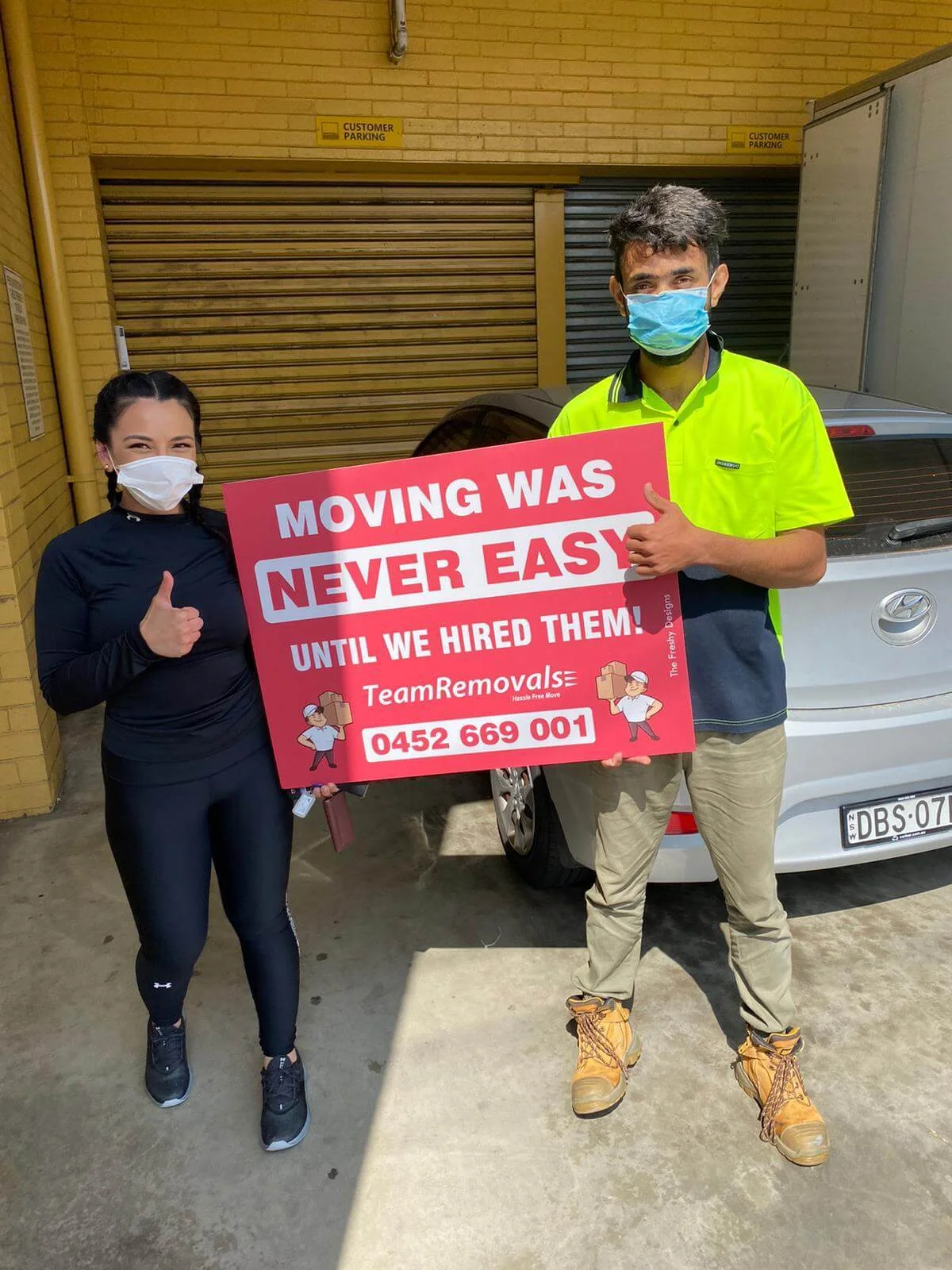 Satisfied customer reviewing Team Removals furniture moving service