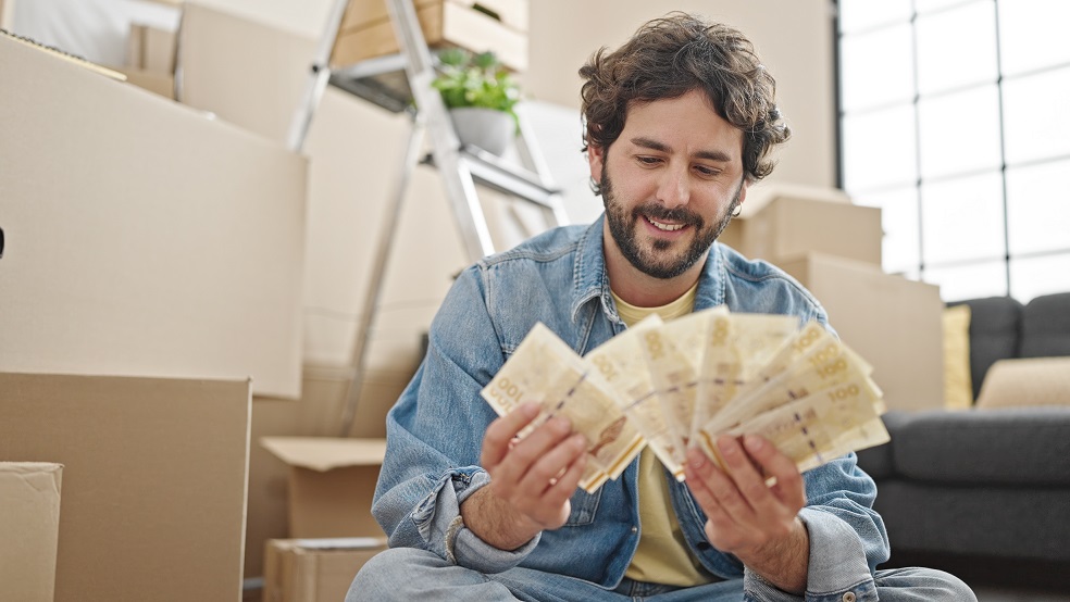 Man with cash for moving services