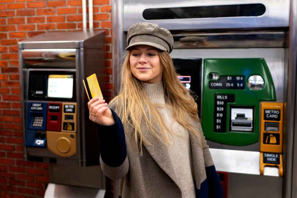 A Woman Holding Myki Card For Transportation In Melbourne